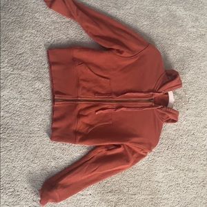 brunt orange zip up